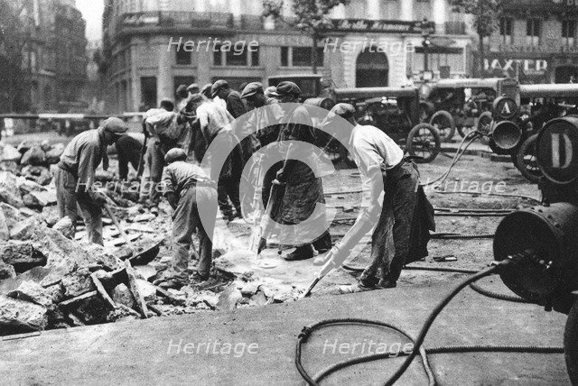 Renewing the roads on the Grands Boulevards, Paris, 1931.Artist: Ernest Flammarion
