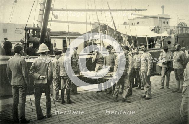 'Arrival at Cape Town of Wounded from Natal', 1900. Creator: Hosking.