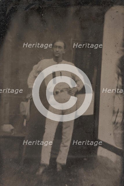 Man with a Bucket on his Arm, 1880s-90s. Creator: Unknown.