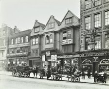 Horse drawn vehicles and barrows in Borough High Street, London, 1904. Artist: Unknown.