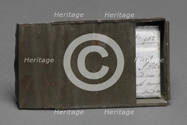 Freedom papers and handmade tin carrying box belonging to Joseph Trammell, 1852. Creator: Joseph Trammell.