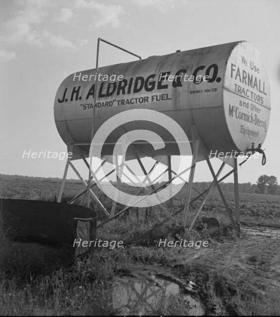 Fuel tank on the Aldridge Plantation, Mississippi, 1937. Creator: Dorothea Lange.