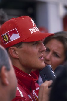 Michael Schumacher being interviewed, British Grand Prix, Silverstone, Northamptonshire, 1997. Artist: Unknown