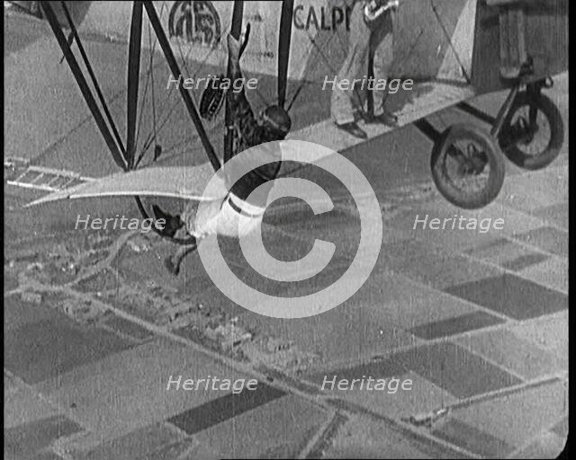 Jazz Musicians Playing from the Wing of a Biplane in the Air, 1921. Creator: British Pathe Ltd.