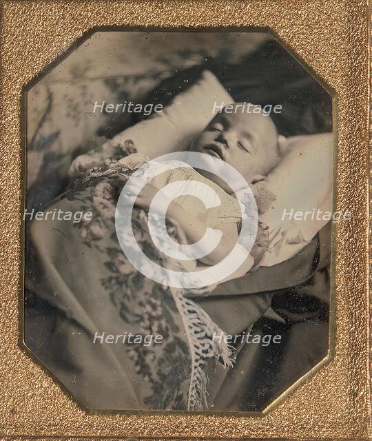 Postmortem Baby, Partially Covered by a Flowered Shawl with a Fringe Hem, 1840s. Creator: Unknown.