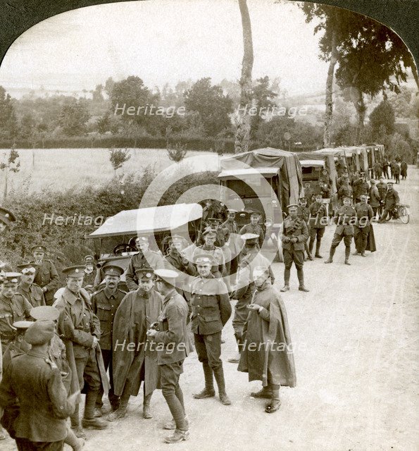 Ammunition convoy parked in a Flanders lane awaiting orders, World War I, 1914-1918.Artist: Realistic Travels Publishers