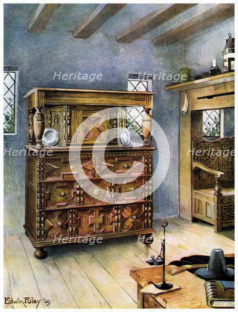 The Putnam Cupboard of English oak and cedar, and carved settle of American oak, 1910.Artist: Edwin Foley