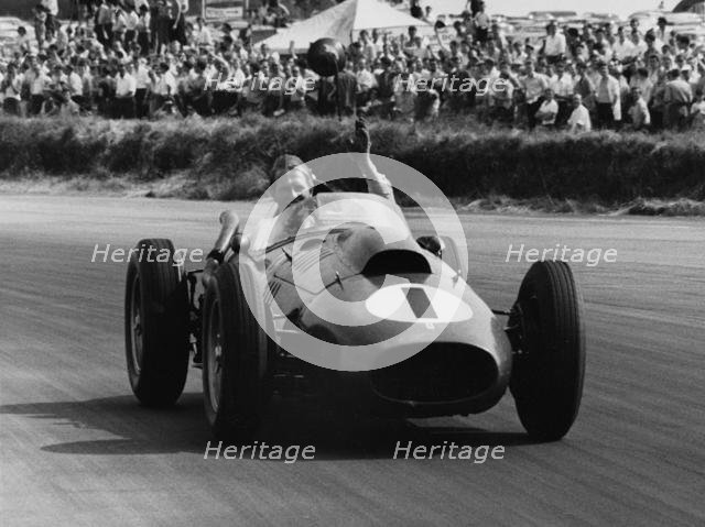 Peter Collins celebrates with lap of honour in Ferrari, 1958 British GP. Creator: Unknown.
