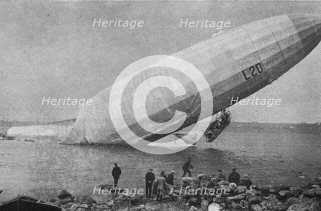 'Trois Zeppelins detruits en trois jours. Le "L20" dans un fjord de Norvege; En derivant..., 1916. Creator: Unknown.