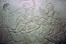 Detail of an Egyptian stele showing an overseer, slaves and scribe. Artist: Unknown