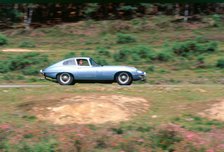 1965 Jaguar E type with smiling driver. Artist: Unknown.