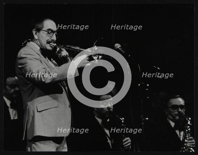 Trombonist Don Lusher playing with the Ted Heath Orchestra. Artist: Denis Williams