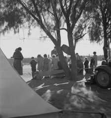 Sunday school for migrant children in a potato pickers' camp, Kern County, California, 1937. Creator: Dorothea Lange.