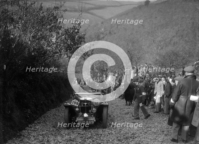MG Magnette of JW Fox competing in the MCC Lands End Trial, Beggars Roost, Devon, 1936. Artist: Bill Brunell.