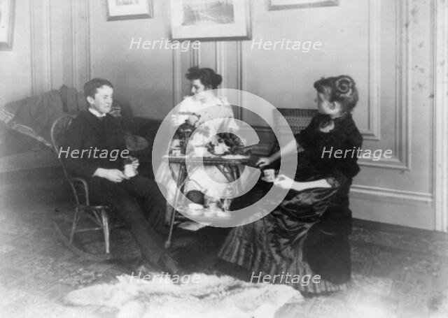 Frances Benjamin Johnston, full lgth., seated, having tea with 2 other people, n.d.. Creator: Frances Benjamin Johnston.