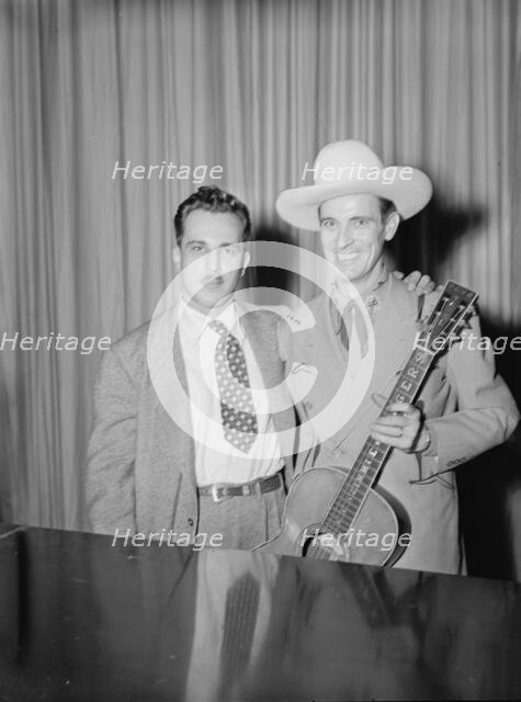 Portrait of Dave Miller and Ernest Tubb, Carnegie Hall, New York, N.Y., Sept. 18-19, 1947. Creator: William Paul Gottlieb.