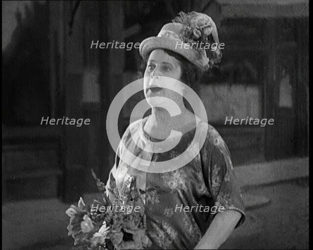 Lily Morris Performing 'Why Am I Always a Bridesmaid?' on a Stage Made to Look Like a..., 1920. Creator: British Pathe Ltd.