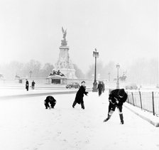 Children playing in the snow, London, 1957. Artist: Henry Grant