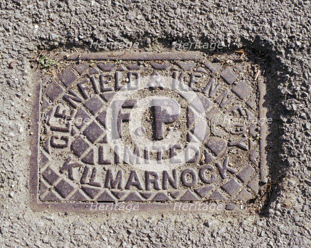 Iron water stop tap cover plate made by Clenfield & Kennedy of Kilmarnock, Swindon, Wiltshire, 2006. Artist: Peter Williams.