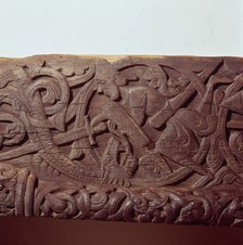 Sigurd kills the Dragon, Fafnir. Detail of wood panel of Hylestad Church, Norway.  Artist: Unknown.