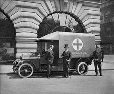 Motor ambulance on the Strand, Westminster, London, May 1915. Artist: H Bedford Lemere.