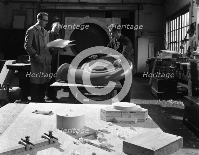 Quality checking a casting for a pump, Rotherham, South Yorkshire, 1963. Artist: Michael Walters