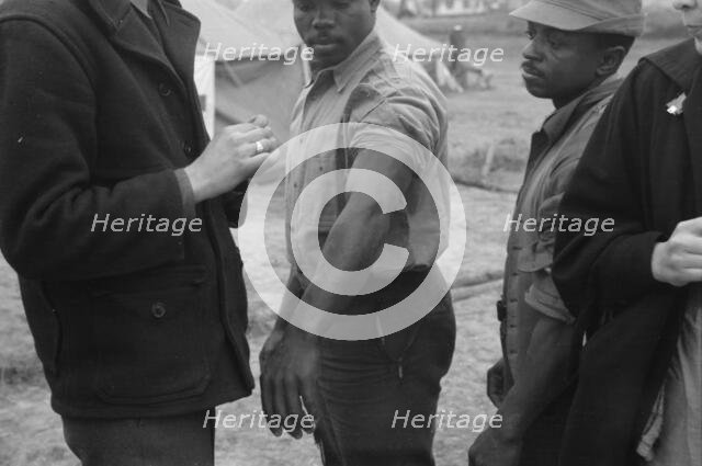 Vaccination in the camp for Negro flood refugees at Marianna, Arkansas, 1937. Creator: Walker Evans.
