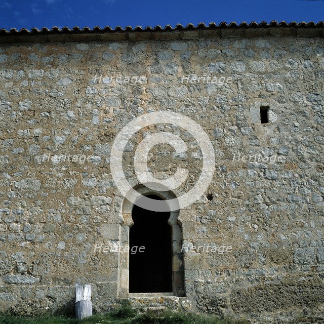 Detail of the front door with a horseshoe arch of the chapel of San Baudelio de Berlanga.