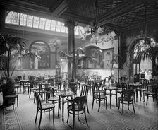 The winter garden in the Monico Restaurant. Shaftesbury Avenue, Westminster, London, 1915. Artist: Bedford Lemere and Company