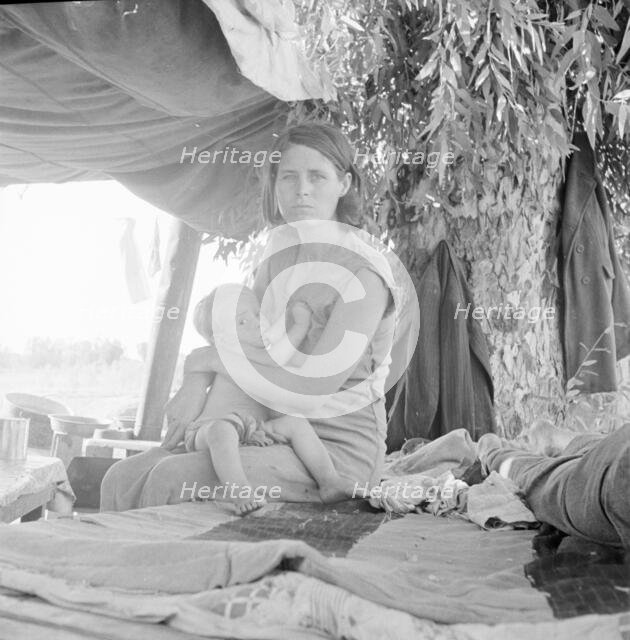Drought refugees from Oklahoma camping by the roadside, Blythe, California, 1936. Creator: Dorothea Lange.