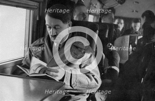 Adolf Hitler on an aeroplane, 1936. Artist: Unknown