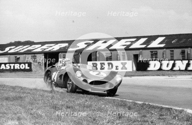 Carroll Shelby driving Aston Martin DBR1, TT race, Goodwood, Sussex, 1959. Artist: Maxwell Boyd