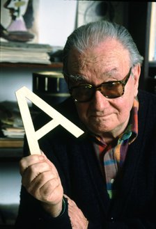 Joan Brossa i Cuervo (1919-1998), poet and Catalan artist, with a letter A in the hand.