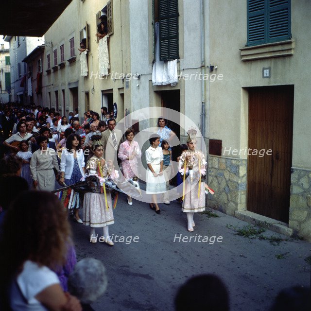 The Eagles', popular characters that dance preceding the procession of Corpus Christi day, held i…