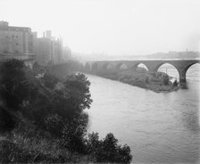 Minneapolis, view from across river, between 1880 and 1899. Creator: Unknown.