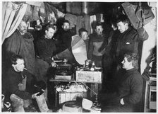 'Music in the Hut', Scott's South Pole expedition, 1911. Artist: Herbert Ponting