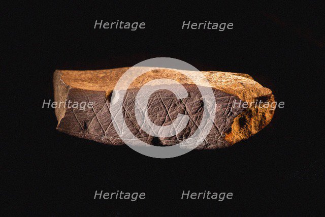 Engraved Ocher Plaque from Blombos Cave, South Africa. The oldest artifact of mankind, 70th millenni