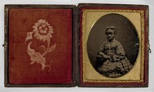 Tintype of a girl in a plaid dress, 1870s. Creator: Unknown.