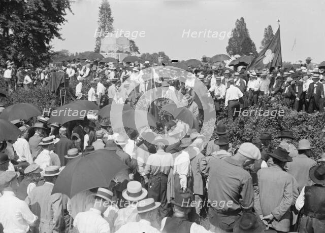 The reunion at "Bloody Angle" - Pickett's men in for[e]ground; Union men lined against wall, 1913. Creator: Bain News Service.