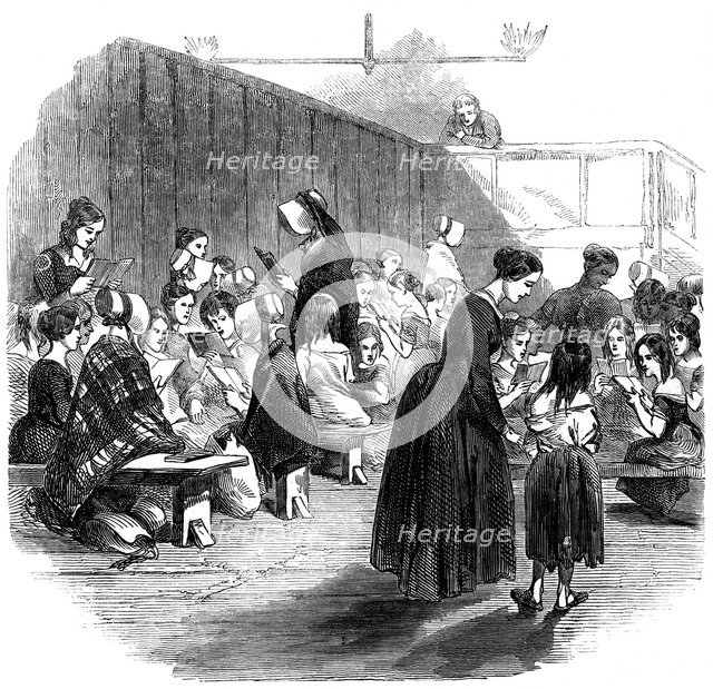 Teaching girls to read in the Ragged School Union school, Lambeth, London, 1868. Artist: Unknown