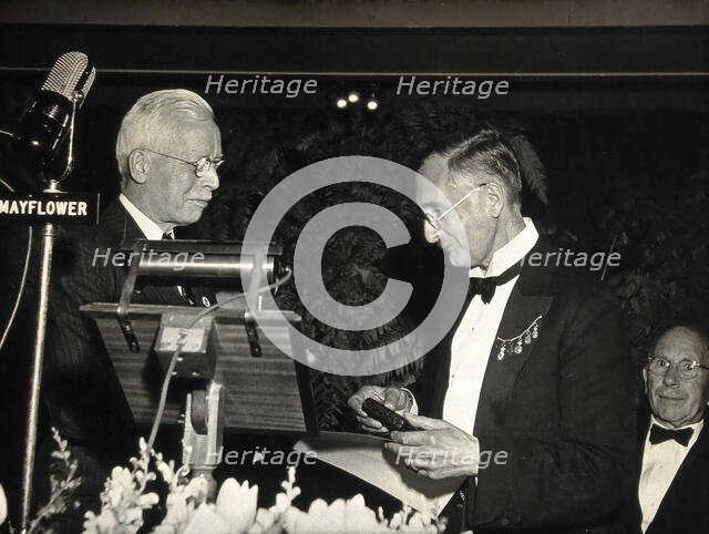 NH Swellengrebel receiving the Laveran Prize from Rolla Dyer, 1948. Creator: Unknown.