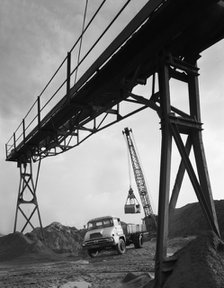 Loading a Ford Thames Trader tipper lorry, Finningley, near Doncaster, South Yorkshire, 1966. Artist: Michael Walters