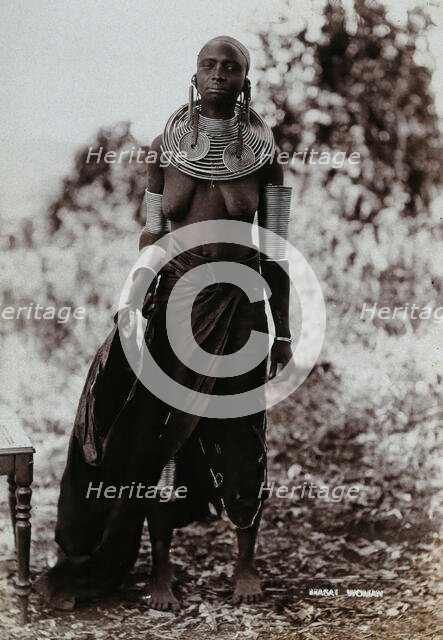 A young Masai woman, full length, wearing much jewellery, 1900. Creator: Unknown.