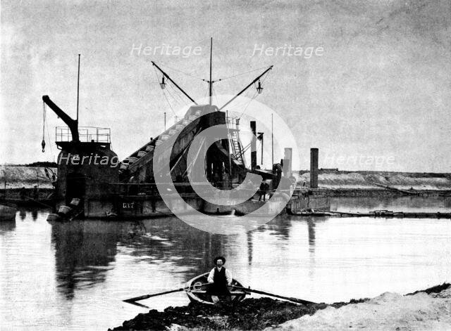 The Opening of the Baltic Canal: a floating dredge employed in deepening the canal, 1895. Creator: Unknown.
