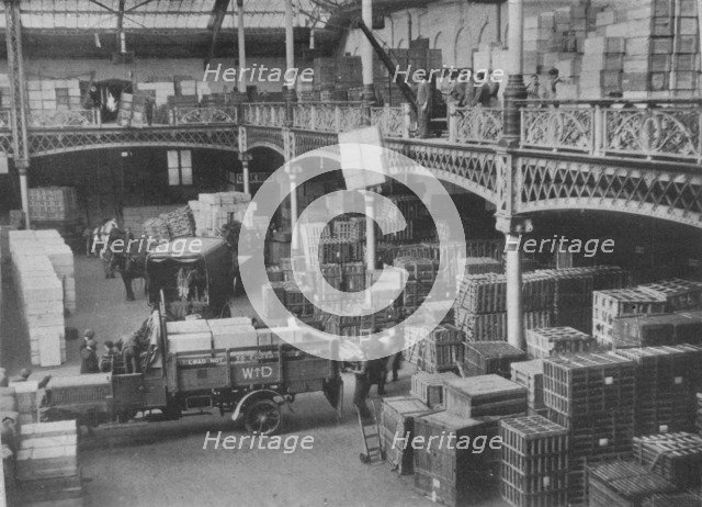 'The despatching room of one of the great Government stores', 1915. Artist: Unknown.