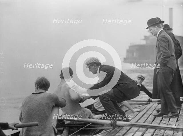 Rice, coach of Columbia Varsity crew team instructing, 1910. Creator: Bain News Service.