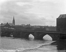 Chester weir and Old Dee Bridge on River Dee with Chester Cathedral in the background, 1902. Creator: Robert Augustus Henry L'Estrange.