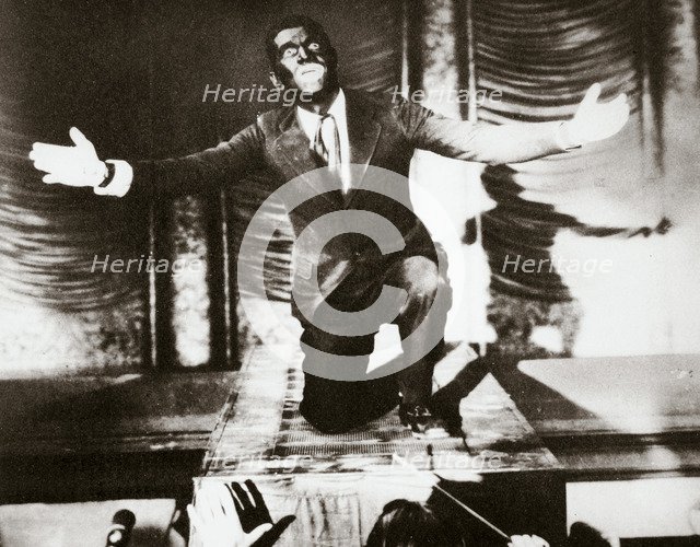 Al Jolson, American singer, in the final scene from the film 'The Jazz Singer', 1927. Artist: Unknown