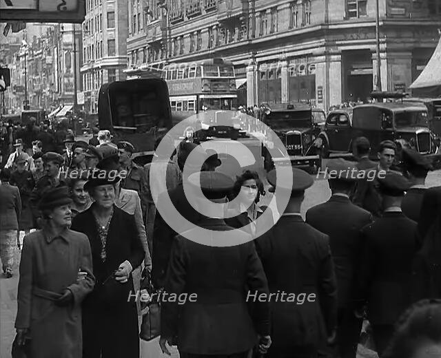 Troops from the USA or  Commonwealth Walking Through London, 1943. Creator: British Pathe Ltd.