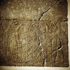 Assyrian relief of a Sacred tree flanked by two winged genies. Artist: Unknown
